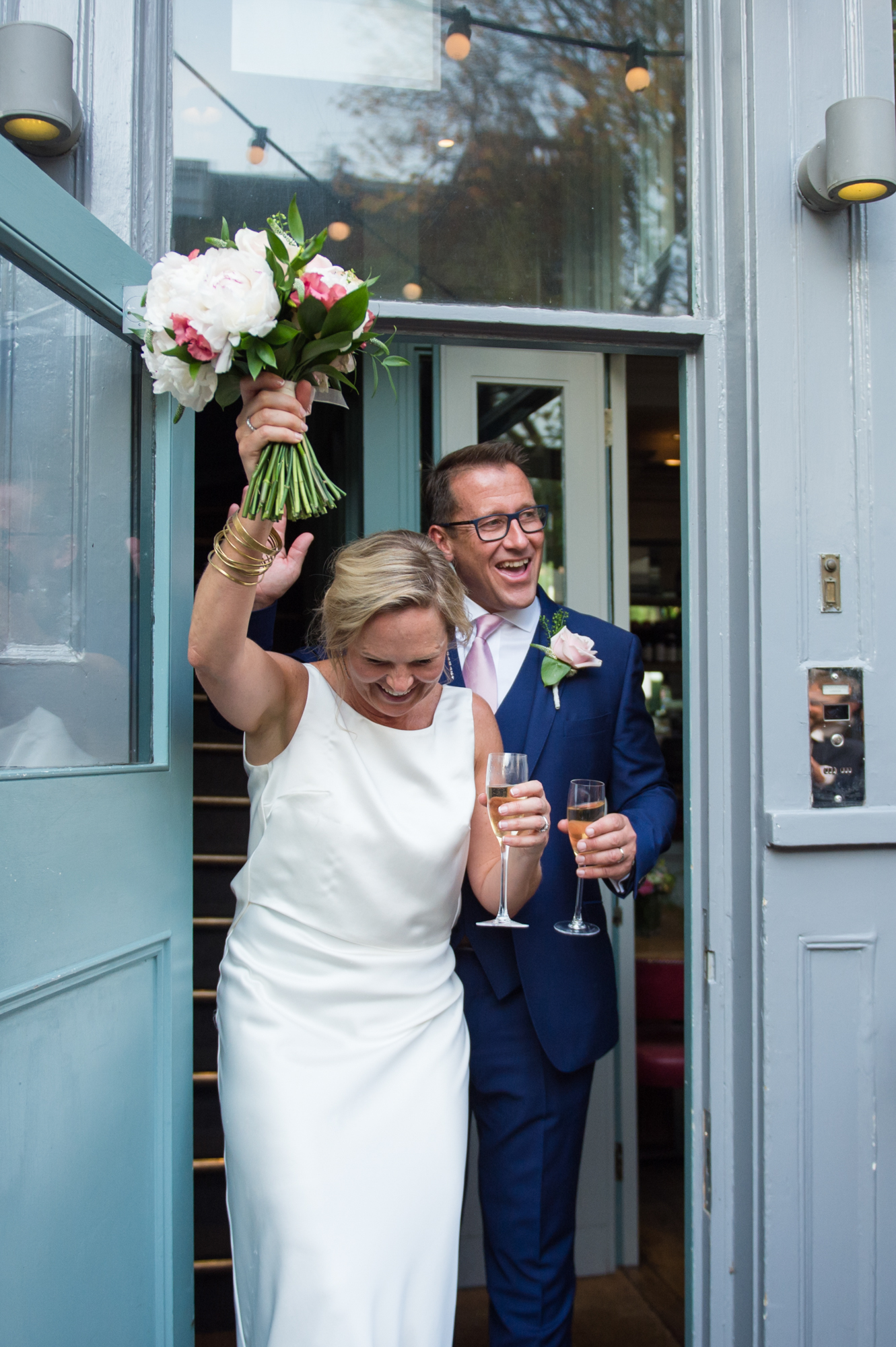 couple arriving at the phene pub for their intimate wedding reception in chelsea london